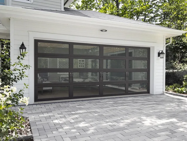Matthews Garage Door Repair design specialist presenting custom garage door options to Matthews homeowner