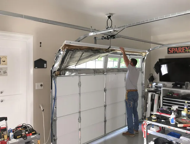 Garage door section replacement by Matthews Garage Door Repair in Matthews
