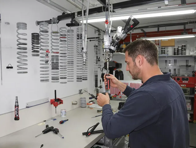 Matthews Garage Door Repair safety certified technician performing precision spring replacement in Matthews