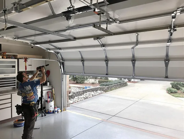 Garage door track repair service by Matthews Garage Door Repair in Matthews